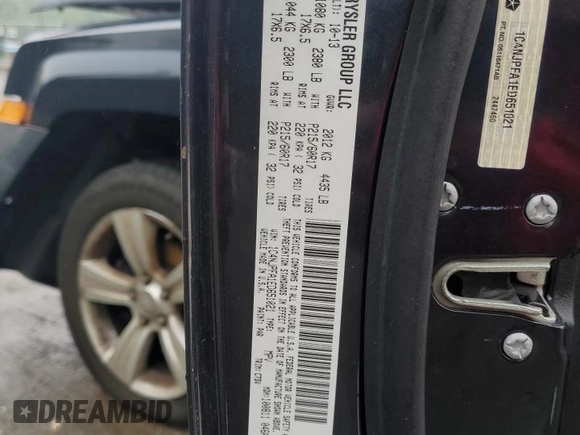 2014 Jeep Patriot Latitude with VIN 1C4NJPFA1ED651021, listed as a Copart auction lot 56947445 with 137,239 mi miles and Salvage title. Bid and sale history available at DreamBid. Image 14.