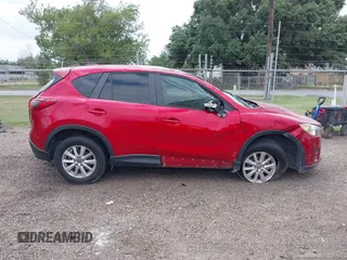 2016 Mazda CX-5 Sport with VIN JM3KE2BYXG0668401, listed as a IAAI auction lot 42370910 with Not provided miles and . Bid and sale history available at DreamBid. Image 14.