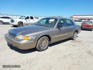 2001 Mercury Grand Marquis GS with VIN 2MEFM74W21X616080, listed as a IAAI auction lot 41849833 with 1 mi miles. Bid and sale history available at carsss.com. Image 2.