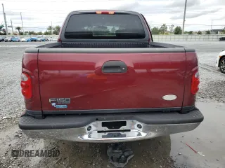2003 Ford F-150 XLT with VIN 1FTRW07673KA75061, listed as a Copart auction lot 52034595 with Not Provided miles and Salvage Title. Bid and sale history available at carsss.com. Image 6.