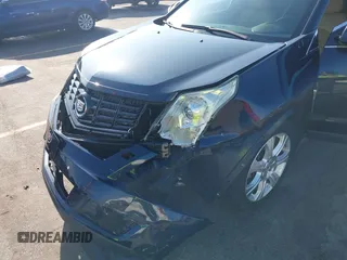 2014 Cadillac SRX Performance Collection with VIN 3GYFNCE39ES613051, listed as a IAAI auction lot 42113063 with 82,952 mi miles and . Bid and sale history available at carsss.com. Image 6.