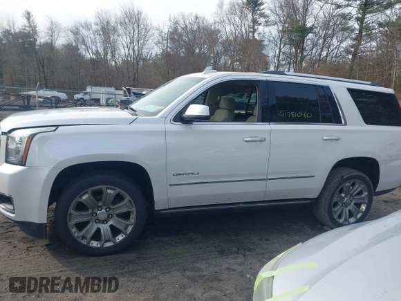 2016 GMC Yukon Denali with VIN 1GKS2CKJ9GR334645, listed as a IAAI auction lot 41781040 with 141,405 mi miles. Bid and sale history available at carsss.com. Image 14.