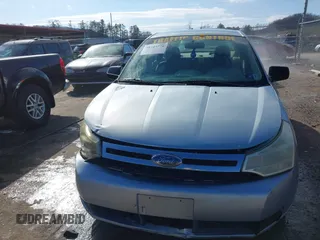 2008 Ford Focus S with VIN 1FAHP34NX8W223229, listed as a IAAI auction lot 38747770 with 232,432 mi miles. Bid and sale history available at carsss.com. Image 12.