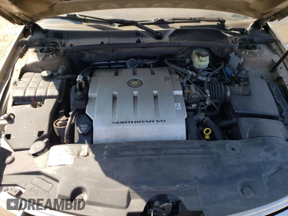 2006 Cadillac DTS 1SD z VIN 1G6KD57Y16U117113, wystawiony jako Copart lot #71485044 z przebiegiem 109 948 mil mil oraz Szkoda całkowita • Salvage title. Historia ofert i sprzedaży dostępna na DreamBid. Obrazek 12.