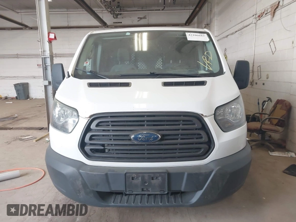 2015 Ford Transit Cargo z VIN 1FTNE1YG9FKB08497, wystawiony jako IAAI lot #42106682 z przebiegiem 158 992 mil mil oraz . Historia ofert i sprzedaży dostępna na DreamBid. Obrazek 12.