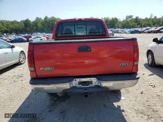 2000 Ford Super Duty F-250 XL with VIN 1FTNX21L7YEB52488, listed as a Copart auction lot 68732404 with 172,765 mi miles and Salvage Title. Bid and sale history available at carsss.com. Image 6.