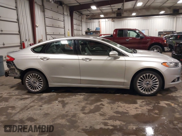 2016 Ford Fusion Titanium with VIN 3FA6P0K96GR150907, listed as a IAAI auction lot 42291933 with 200,463 mi miles and . Bid and sale history available at DreamBid. Image 14.