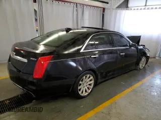 2016 Cadillac CTS AWD with VIN 1G6AW5SX7G0103004, listed as a Copart auction lot 57324334 with 95,772 mi miles and Clean title. Bid and sale history available at DreamBid. Image 3.