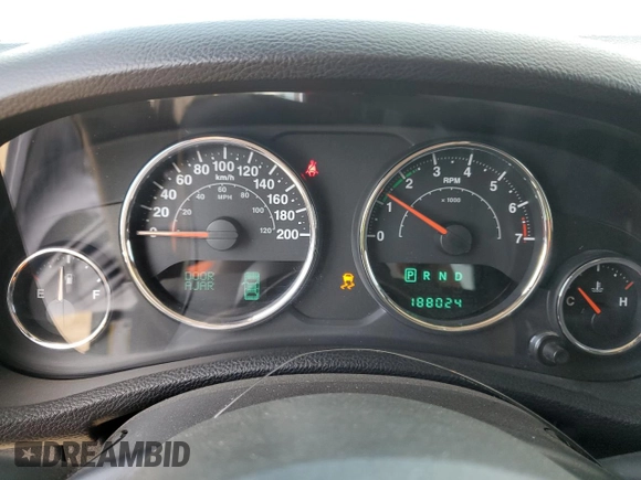 2014 Jeep Wrangler Unlimited Sahara with VIN 1C4BJWEG7EL228307, listed as a Copart auction lot 58663455 with 188,024 mi miles and Salvage title. Bid and sale history available at DreamBid. Image 9.