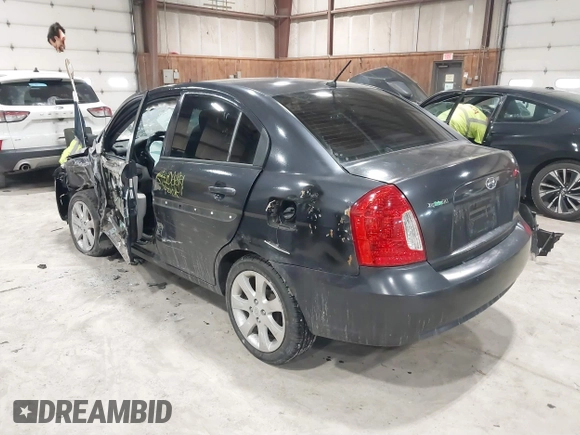 2008 Hyundai Accent GLS with VIN KMHCN46C78U212384, listed as a IAAI auction lot 41596092 with 178,562 mi miles. Bid and sale history available at carsss.com. Image 3.
