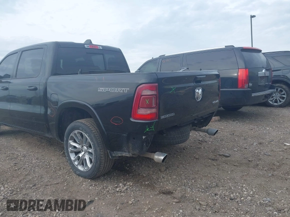 2022 Ram 1500 Laramie with VIN 1C6SRFJT6NN402536, listed as a IAAI auction lot 42109220 with 29,618 mi miles and . Bid and sale history available at DreamBid. Image 3.