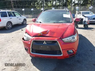 2011 Mitsubishi Outlander Sport SE with VIN JA4AP4AU3BZ022916, listed as a IAAI auction lot 42036738 with 145,070 mi miles. Bid and sale history available at carsss.com. Image 12.