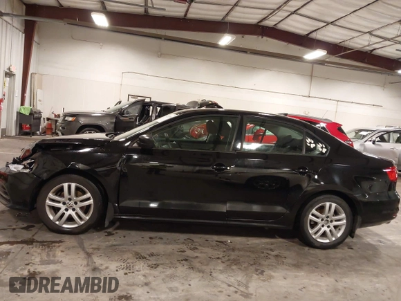 2015 Volkswagen Jetta S with VIN 3VW2K7AJ4FM243087, listed as a IAAI auction lot 42525961 with 118,224 mi miles and . Bid and sale history available at DreamBid. Image 15.