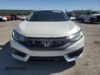 2016 Honda Civic EX-T z VIN 19XFC1F35GE029827, wystawiony jako Copart lot #55698325 z przebiegiem 108 297 mil mil oraz Szkoda całkowita • Salvage title. Historia ofert i sprzedaży dostępna na DreamBid. Obrazek 5.