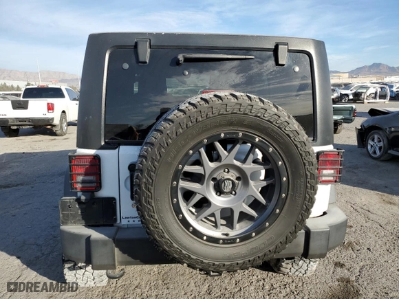 2012 Jeep Wrangler Unlimited Sport with VIN 1C4HJWDGXCL268227, listed as a Copart auction lot 86121234 with 137,585 mi miles and Salvage Title. Bid and sale history available at carsss.com. Image 6.
