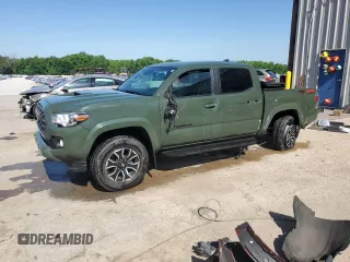 2022 Toyota Tacoma SR z VIN 3TMCZ5AN8NM519084, wystawiony jako Copart lot #57512005 z przebiegiem 23 692 mil mil oraz Szkoda całkowita • Salvage title. Historia ofert i sprzedaży dostępna na DreamBid. Obrazek 1.