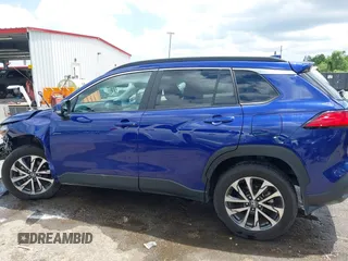 2023 Toyota Corolla Cross XLE with VIN 7MUEAAAG7PV065106, listed as a IAAI auction lot 42168195 with 6,519 mi miles and . Bid and sale history available at DreamBid. Image 14.