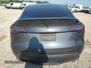 2023 Tesla Model Y Long Range z VIN 7SAYGDEE7PA199067, wystawiony jako Copart lot #52463215 z przebiegiem 30 978 mil mil oraz Szkoda całkowita • Salvage title. Historia ofert i sprzedaży dostępna na DreamBid. Obrazek 6.