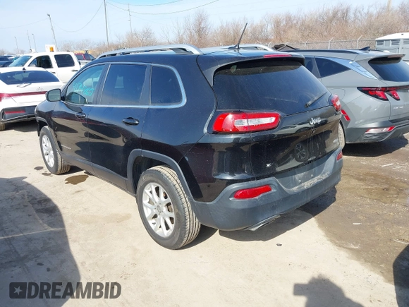 2015 Jeep Cherokee North with VIN 1C4PJMCS4FW792918, listed as a IAAI auction lot 41748651 with 107,034 mi miles. Bid and sale history available at carsss.com. Image 3.