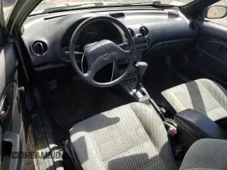 1992 Toyota Tercel z VIN JT2EL43B1N0209927, wystawiony jako Copart lot #57595275 z przebiegiem 87 577 mil mil oraz Tytuł czysty. Historia ofert i sprzedaży dostępna na DreamBid. Obrazek 8.