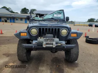 2005 Jeep Wrangler Rubicon with VIN 1J4FA69S75P340544, listed as a Copart auction lot 73085774 with 104,046 mi miles and Salvage Title. Bid and sale history available at carsss.com. Image 5.