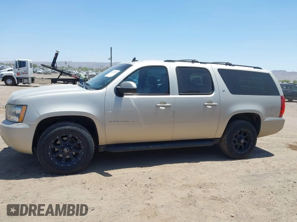 2013 Chevrolet Suburban LT with VIN 1GNSKJE70DR127208, listed as a IAAI auction lot 42285279 with 295,930 mi miles and . Bid and sale history available at DreamBid. Image 14.