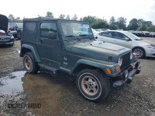 2003 Jeep Wrangler Sahara with VIN 1J4FA59S73P308250, listed as a Copart auction lot 64305965 with 186,288 mi miles and Clean title. Bid and sale history available at DreamBid. Image 4.