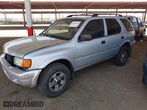 1999 Isuzu Rodeo S with VIN 4S2CM58W9X4354789, listed as a IAAI auction lot 42444956 with Not provided miles and . Bid and sale history available at DreamBid. Image 2.