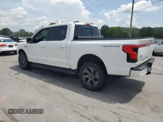 2022 Ford F-150 Lightning Pro with VIN 1FTVW1EL3NWG16146, listed as a Copart auction lot 65322785 with 68,928 mi miles and Salvage title. Bid and sale history available at DreamBid. Image 2.