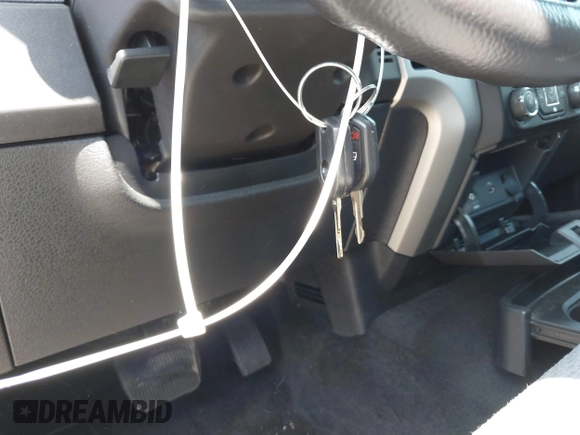 2014 Ford F-150 XL with VIN 1FTFX1CF8EFB98133, listed as a IAAI auction lot 42007052 with 70,530 mi miles and . Bid and sale history available at DreamBid. Image 11.