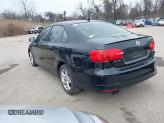 2012 Volkswagen Jetta TDI w/Premium with VIN 3VWLL7AJXCM073394, listed as a IAAI auction lot 41602574 with 159,668 mi miles and . Bid and sale history available at DreamBid. Image 3.