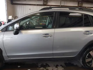 2014 Subaru Crosstrek Touring with VIN JF2GPBKC0EH312164, listed as a IAAI auction lot 42348820 with 214,494 mi miles and . Bid and sale history available at DreamBid. Image 14.