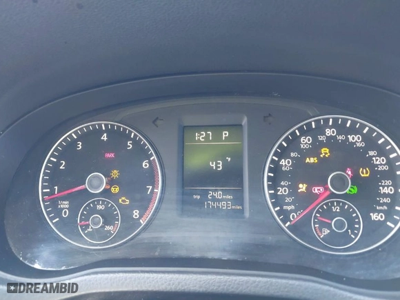 2015 Volkswagen Passat 1.8T S with VIN 1VWAT7A37FC002037, listed as a IAAI auction lot 41616615 with 174,493 mi miles. Bid and sale history available at carsss.com. Image 7.