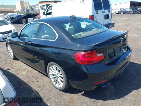 2016 BMW 2 Series 228i with VIN WBA1F9C5XGV545664, listed as a IAAI auction lot 39327505 with 94,583 mi miles. Bid and sale history available at carsss.com. Image 3.