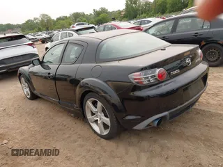 2007 Mazda RX-8 Grand Touring z VIN JM1FE173770211935, wystawiony jako IAAI lot #42392570 z przebiegiem 126 323 mil mil oraz . Historia ofert i sprzedaży dostępna na DreamBid. Obrazek 3.