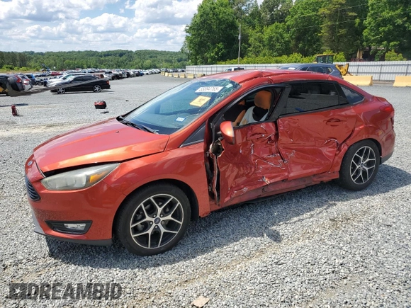 2018 Ford Focus SE with VIN 1FADP3FEXJL269131, listed as a Copart auction lot 55894765 with 33,752 mi miles and Salvage title. Bid and sale history available at DreamBid. Image 1.