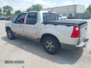 2005 Ford Explorer Sport Trac XLS z VIN 1FMZU77K15UB67801, wystawiony jako IAAI lot #42822163 z przebiegiem 179 102 mil mil oraz . Historia ofert i sprzedaży dostępna na DreamBid. Obrazek 3.