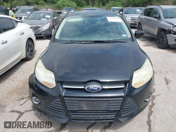 2012 Ford Focus SE with VIN 1FAHP3F28CL361932, listed as a IAAI auction lot 42142318 with 135,179 mi miles and . Bid and sale history available at carsss.com. Image 6.