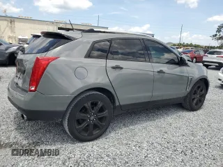 2014 Cadillac SRX Premium Collection z VIN 3GYFNGE30ES627895, wystawiony jako Copart lot #58605985 z przebiegiem 49 300 mil mil oraz Szkoda całkowita • Salvage title. Historia ofert i sprzedaży dostępna na DreamBid. Obrazek 3.