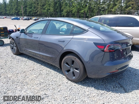 2023 Tesla Model 3 with VIN 5YJ3E1EA6PF664045, listed as a IAAI auction lot 42561039 with 18,708 mi miles and . Bid and sale history available at DreamBid. Image 3.
