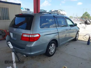 2007 Honda Odyssey EX-L z VIN 5FNRL38657B116038, wystawiony jako IAAI lot #42365429 z przebiegiem 177 518 mil mil oraz . Historia ofert i sprzedaży dostępna na DreamBid. Obrazek 4.