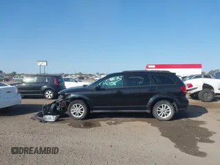 2013 Dodge Journey SXT with VIN 3C4PDCBG7DT710844, listed as a IAAI auction lot 40582910 with 136,741 mi miles and . Bid and sale history available at DreamBid. Image 14.