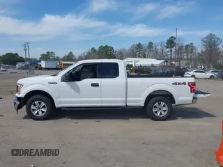 2018 Ford F-150 XL with VIN 1FTEX1EB4JFA77373, listed as a IAAI auction lot 41813197 with 235,251 mi miles and . Bid and sale history available at DreamBid. Image 15.
