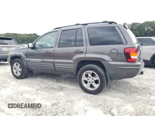 2004 Jeep Grand Cherokee Limited with VIN 1J8GX58N24C333403, listed as a Copart auction lot 73708764 with 145,471 mi miles and Salvage Title. Bid and sale history available at DreamBid. Image 2.