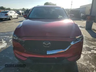 2021 Mazda CX-5 Touring with VIN JM3KFACM7M0393536, listed as a Copart auction lot 48488375 with 76,915 mi miles and Non Repairable. Bid and sale history available at DreamBid. Image 5.