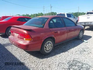 1998 Saturn SL z VIN 1G8ZK5270WZ223002, wystawiony jako IAAI lot #41959507 z przebiegiem Nie podano mil oraz . Historia ofert i sprzedaży dostępna na DreamBid. Obrazek 4.