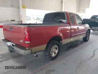 2000 Ford F-150 XL z VIN 1FTRX17W4YNA33505, wystawiony jako IAAI lot #42354938 z przebiegiem Nie podano mil oraz . Historia ofert i sprzedaży dostępna na DreamBid. Obrazek 4.