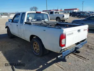 1999 Nissan Frontier XE with VIN 1N6DD26S0XC325585, listed as a IAAI auction lot 41698620 with 209,973 mi miles and . Bid and sale history available at DreamBid. Image 3.
