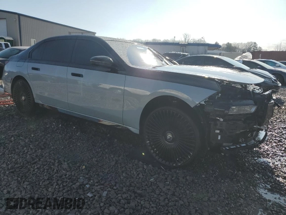 2023 BMW 7 Series 760i xDrive with VIN WBA33EJ09PCN46611, listed as a Copart auction lot 44601795 with 28,497 mi miles and Salvage title. Bid and sale history available at DreamBid. Image 4.