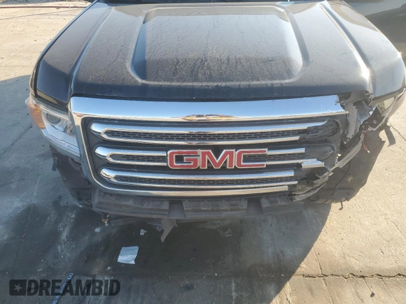 2016 GMC Canyon 2WD SLE with VIN 1GTG5CE39G1275875, listed as a Copart auction lot 88751785 with 124,510 mi miles and Salvage Title. Bid and sale history available at carsss.com. Image 12.